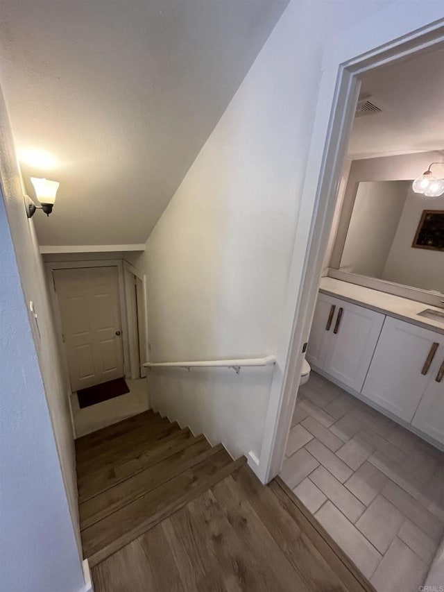 10525 Flora Verda Ct, Santee, CA 92071 - stairway featuring wood finished floors