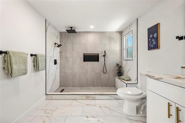 bathroom with walk in shower, vanity, toilet, marble finish floor, and baseboards