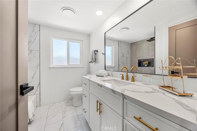 bathroom with toilet, walk in shower, marble finish floor, and vanity