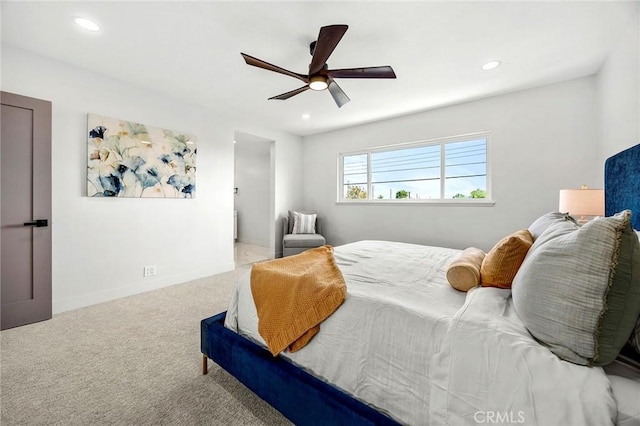 carpeted bedroom featuring recessed lighting, a ceiling fan, and baseboards