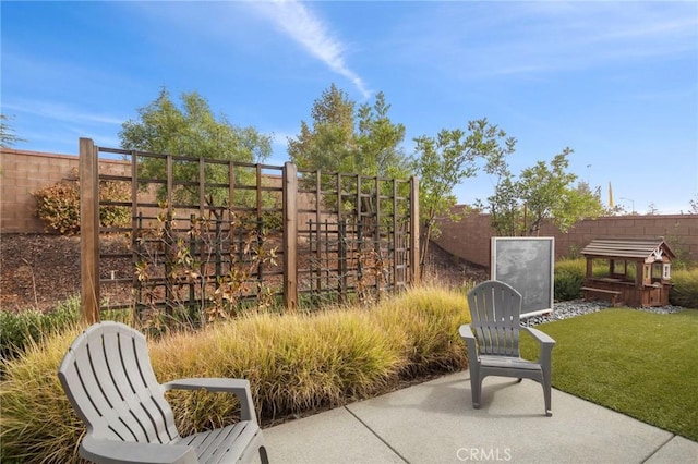 view of patio with a fenced backyard