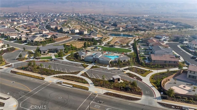 drone / aerial view featuring a mountain view and a residential view