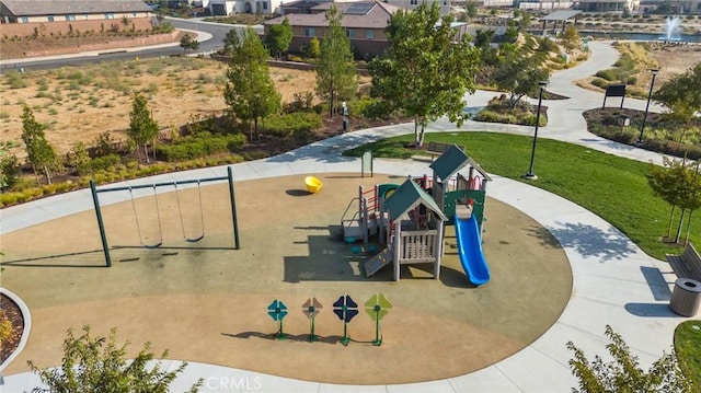 view of community featuring playground community