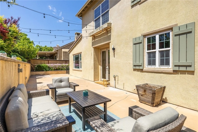 view of patio with a fenced backyard and an outdoor hangout area