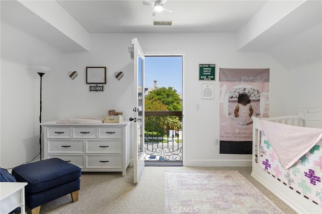 bedroom featuring access to outside and light colored carpet