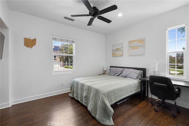 bedroom featuring wood finished floors, baseboards, recessed lighting, and ceiling fan