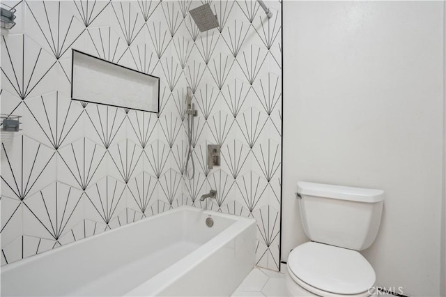 bathroom with shower / tub combination and toilet