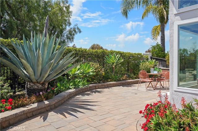view of patio / terrace with fence
