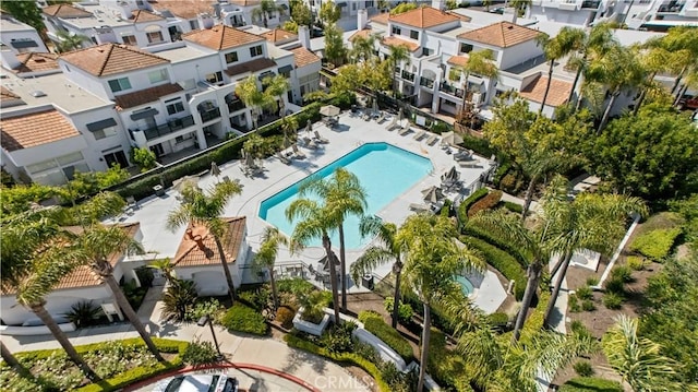 birds eye view of property with a residential view