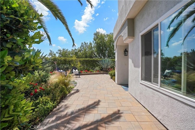 view of patio / terrace with fence