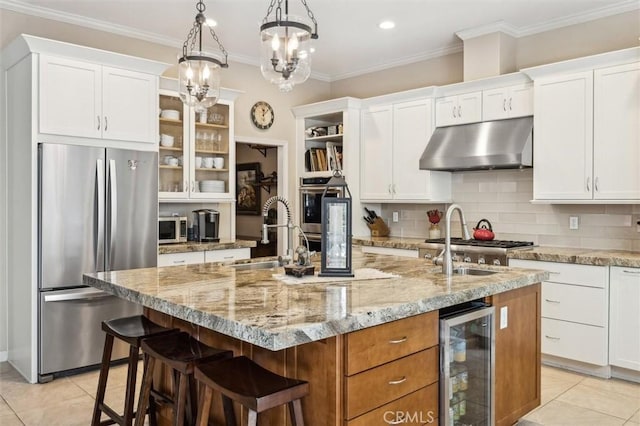 1042 Sleepy Hollow Rd, Paso Robles, CA 93446 - kitchen with stainless steel appliances, under cabinet range hood, beverage cooler, a sink, and light tile patterned floors