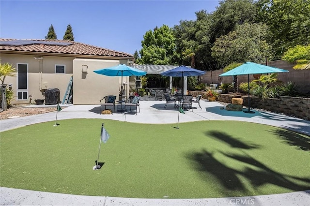 1042 Sleepy Hollow Rd, Paso Robles, CA 93446 - view of home's community with a putting green, a patio, and fence
