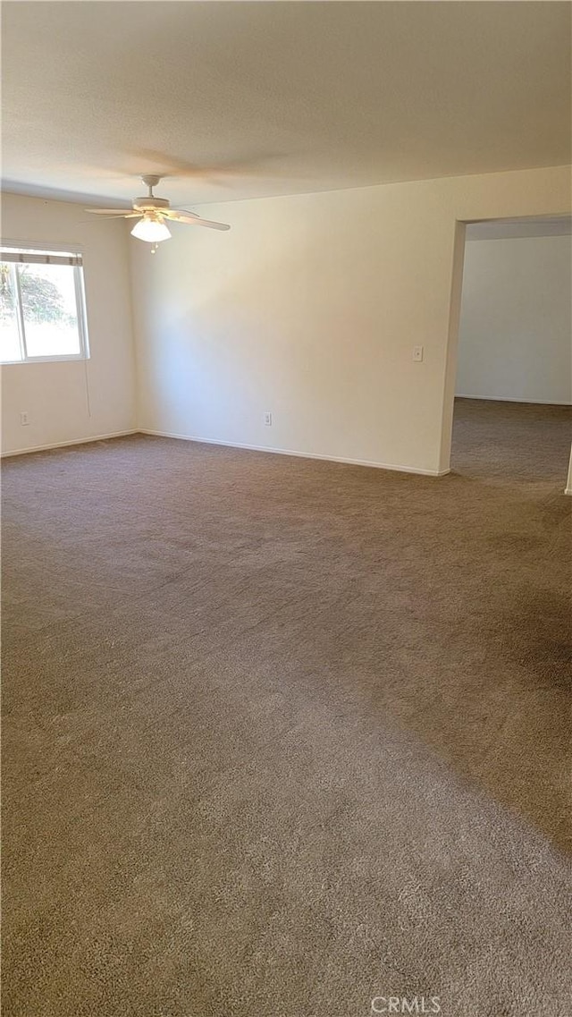 28799 Lavatera Ave, Murrieta, CA 92563 - empty room featuring carpet and ceiling fan
