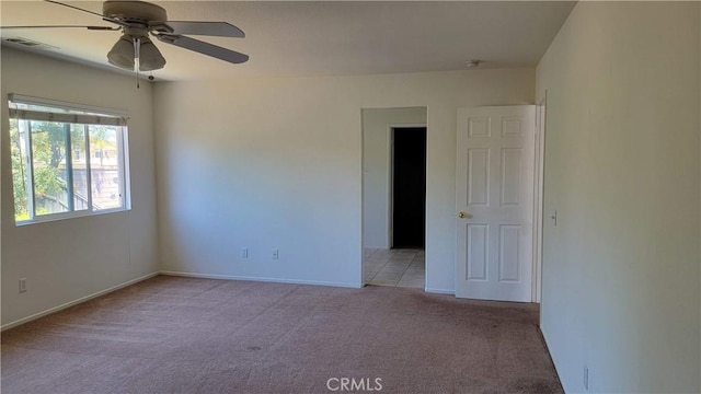 28799 Lavatera Ave, Murrieta, CA 92563 - spare room with baseboards, ceiling fan, visible vents, and light carpet