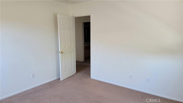 28799 Lavatera Ave, Murrieta, CA 92563 - empty room featuring baseboards and light colored carpet