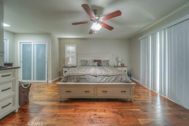 5315 Wheeler Ave, La Verne, CA 91750 - bedroom featuring wood finished floors, a ceiling fan, and baseboards