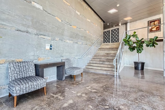 interior space featuring baseboards