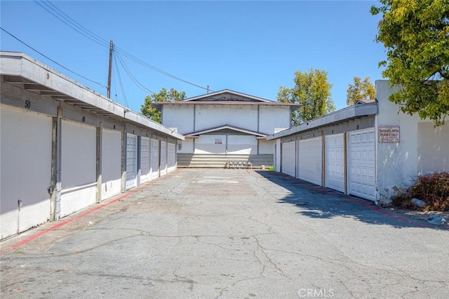 exterior space featuring community garages