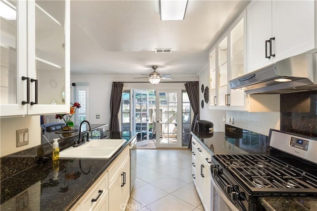 kitchen featuring a sink, ornamental molding, stainless steel appliances, and under cabinet range hood