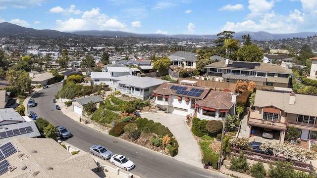 aerial view with a mountain view and a residential view