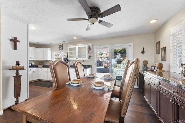 dining area featuring dark wood-style flooring, ceiling fan, and recessed lighting