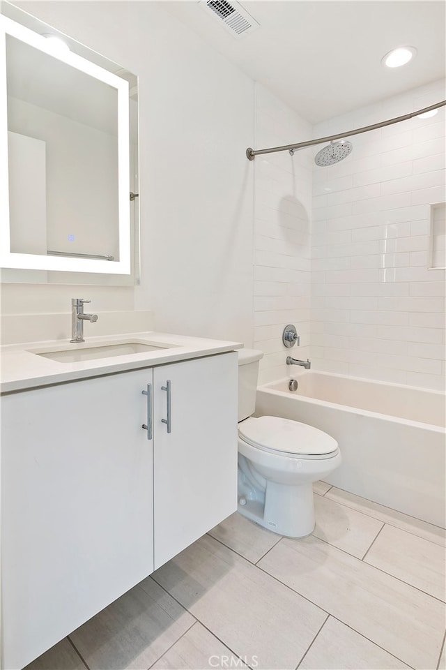 bathroom featuring vanity, toilet, tile patterned floors, tub / shower combination, and visible vents