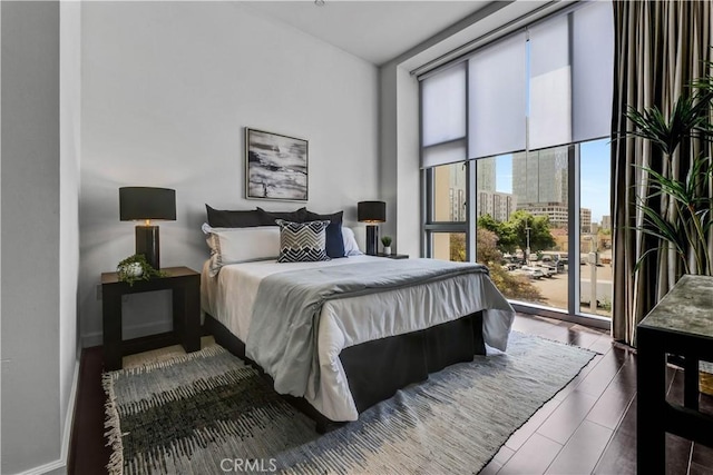 3223 W 6th St Unit 312, Los Angeles, CA 90020 - bedroom with a wall of windows, access to outside, and a city view