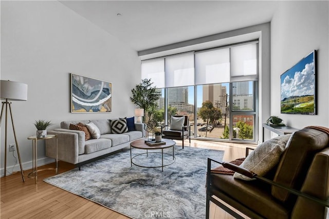 3223 W 6th St Unit 312, Los Angeles, CA 90020 - living room with baseboards and wood finished floors