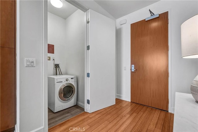 3223 W 6th St Unit 312, Los Angeles, CA 90020 - clothes washing area featuring washer / clothes dryer and light wood finished floors