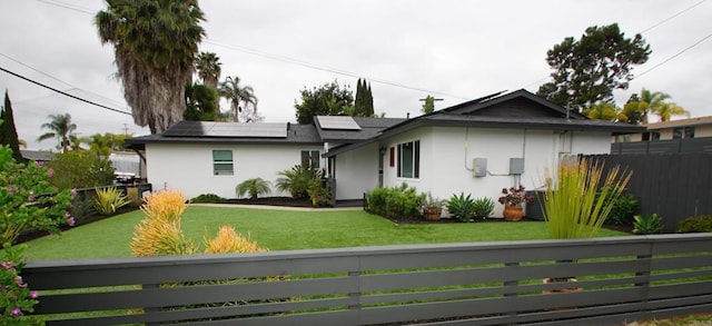 8394 Blue Lake Dr, San Diego, CA 92119 - ranch-style home featuring fence private yard, roof mounted solar panels, stucco siding, and a front yard