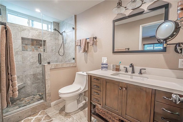 2650 Belburn Pl, Simi Valley, CA 93065 - bathroom featuring a shower stall, toilet, vanity, and a textured wall