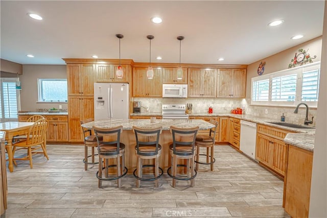 2650 Belburn Pl, Simi Valley, CA 93065 - kitchen with white appliances, a sink, plenty of natural light, recessed lighting, and light wood-type flooring