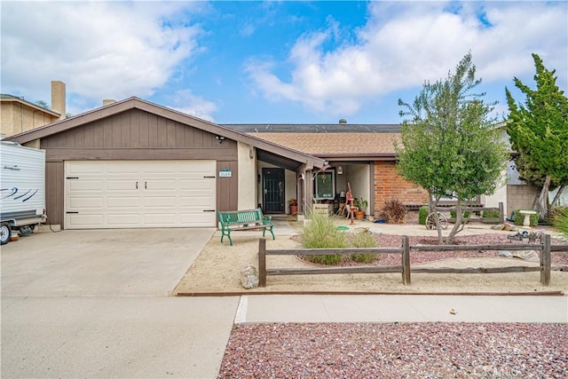 2650 Belburn Pl, Simi Valley, CA 93065 - ranch-style house featuring an attached garage, concrete driveway, brick siding, a shingled roof, and fence