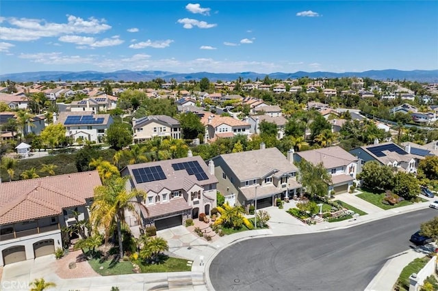 bird's eye view with a residential view and a mountain view