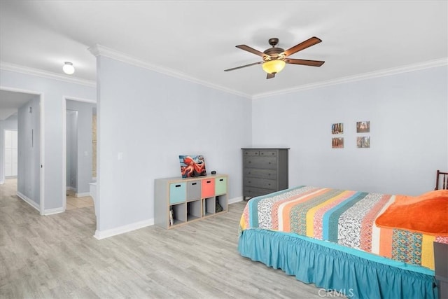 5216 Yarmouth Ave Unit 106, Encino, CA 91316 - bedroom with crown molding, baseboards, a ceiling fan, and wood finished floors