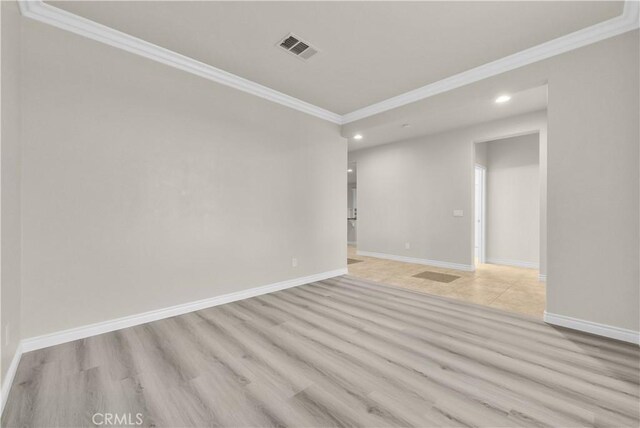 9058 Chimney Rock Ave, Hesperia, CA 92344 - unfurnished room with recessed lighting, baseboards, ornamental molding, visible vents, and light wood-type flooring