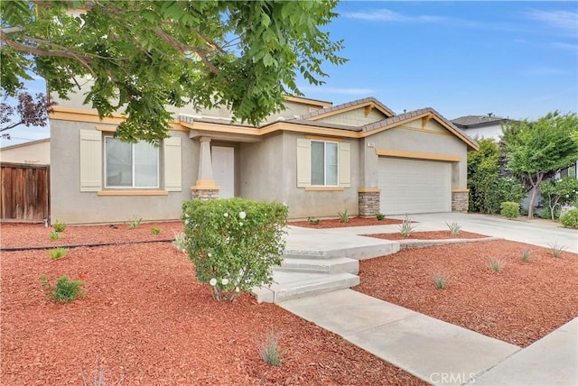 9058 Chimney Rock Ave, Hesperia, CA 92344 - ranch-style house featuring fence, an attached garage, stone siding, driveway, and stucco siding