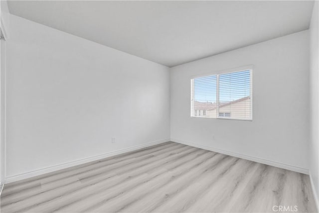 9058 Chimney Rock Ave, Hesperia, CA 92344 - unfurnished room with light wood-style flooring and baseboards