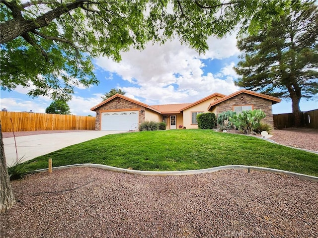 ranch-style home featuring fence, a garage, stone siding, concrete driveway, and a front yard