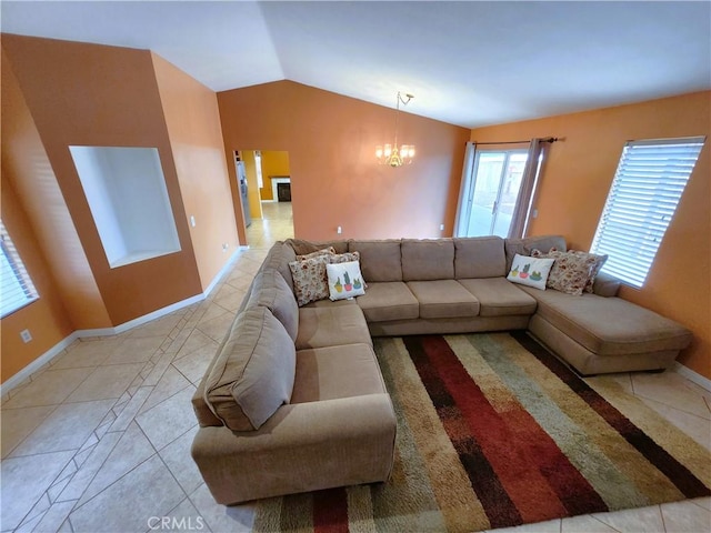 tiled living room featuring baseboards, a chandelier, and vaulted ceiling