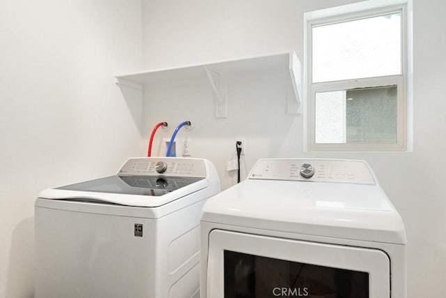 24060 Raptor Way, Lake Elsinore, CA 92532 - laundry area with washing machine and clothes dryer