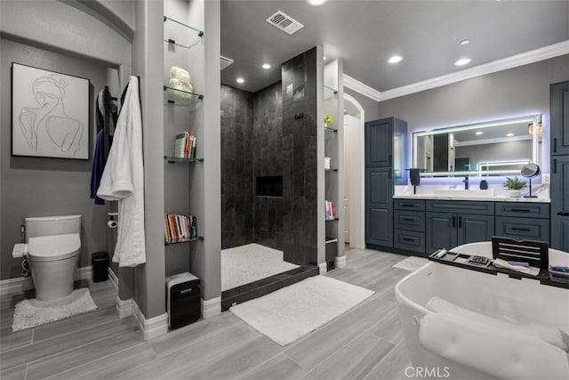 bathroom featuring crown molding, visible vents, wood finished floors, toilet, and a walk in shower