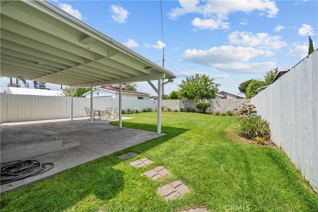 941 N Brand Blvd, San Fernando, CA 91340 - fenced backyard featuring a patio area