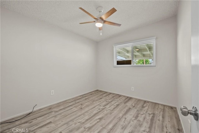 941 N Brand Blvd, San Fernando, CA 91340 - empty room with wood finished floors, a ceiling fan, and a textured ceiling