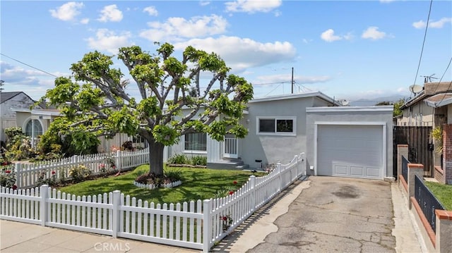 941 N Brand Blvd, San Fernando, CA 91340 - view of front of property featuring driveway, an attached garage, and stucco siding