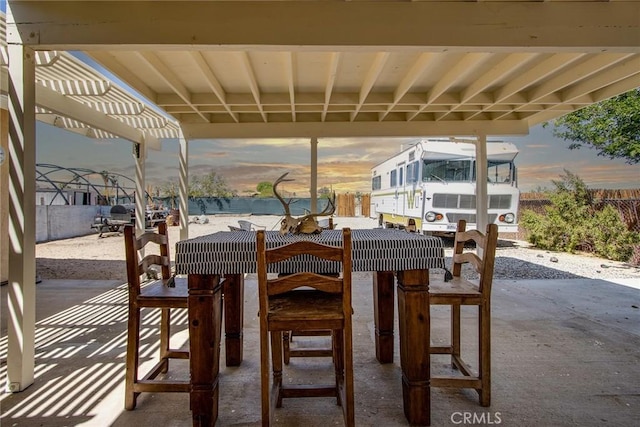 view of patio terrace at dusk