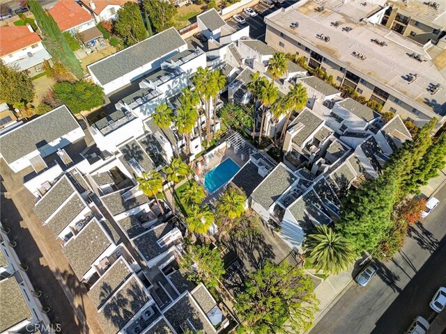 birds eye view of property with a residential view