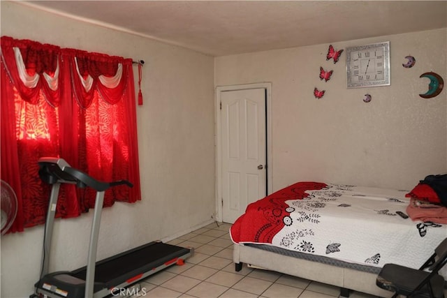 bedroom with tile patterned floors