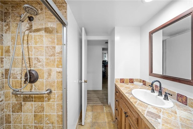 10535 Wilshire Blvd Unit D01, Los Angeles, CA 90024 - full bathroom featuring a shower stall, vanity, and stone finish floors