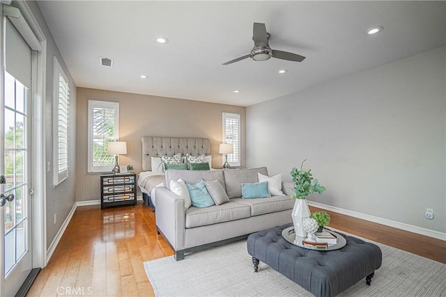 bedroom featuring recessed lighting, baseboards, visible vents, and light wood-type flooring